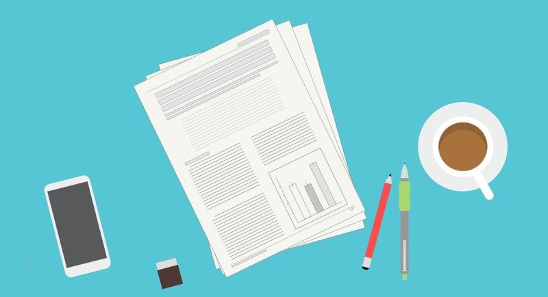 Illustration of a pile of papers on a blue table or background, with a cup of coffee, phone, pen, pencil and eraser alongside. 
